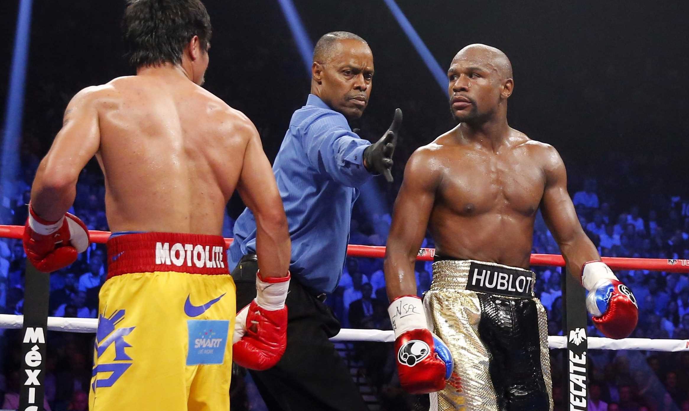 Floyd Mayweather and Manny Pacquiao Come Face-to-Face at LA Clippers Game